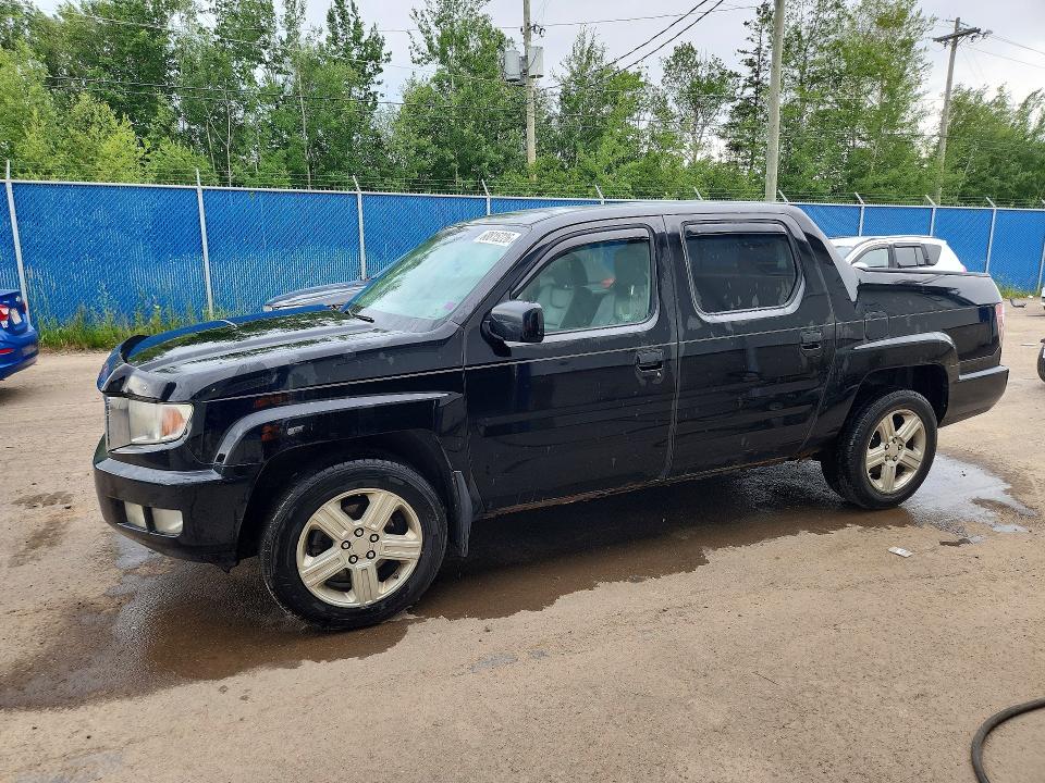 HONDA RIDGELINE 2010 with VIN 5FPYK1F59AB001471 - Photo from auction