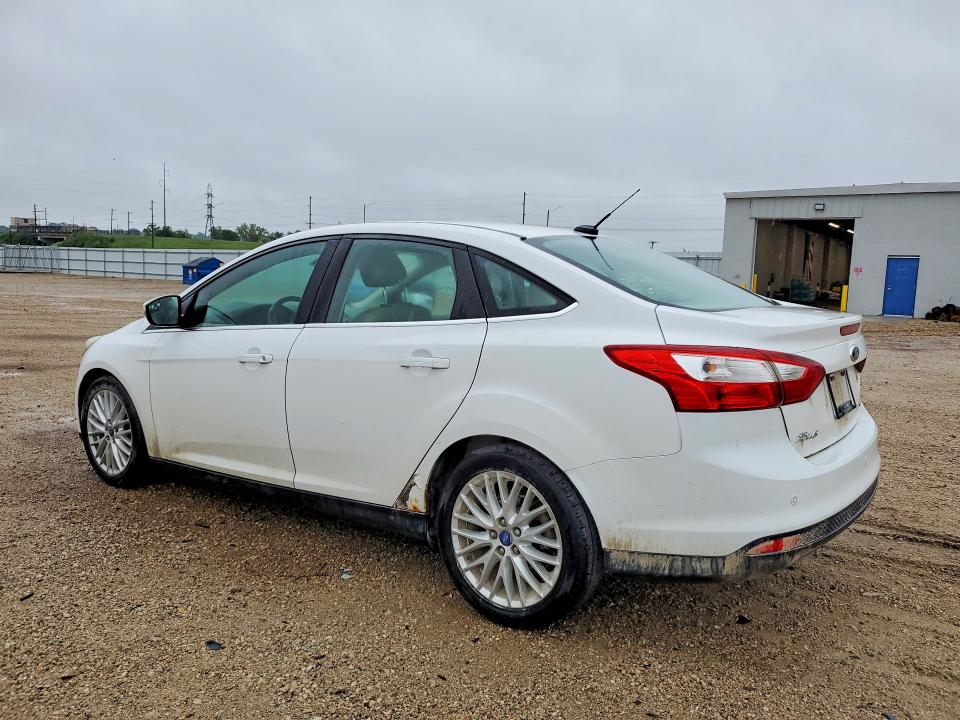 Photo 2 from auction – 2012 FORD FOCUS with VIN 1FAHP3H28CL309925