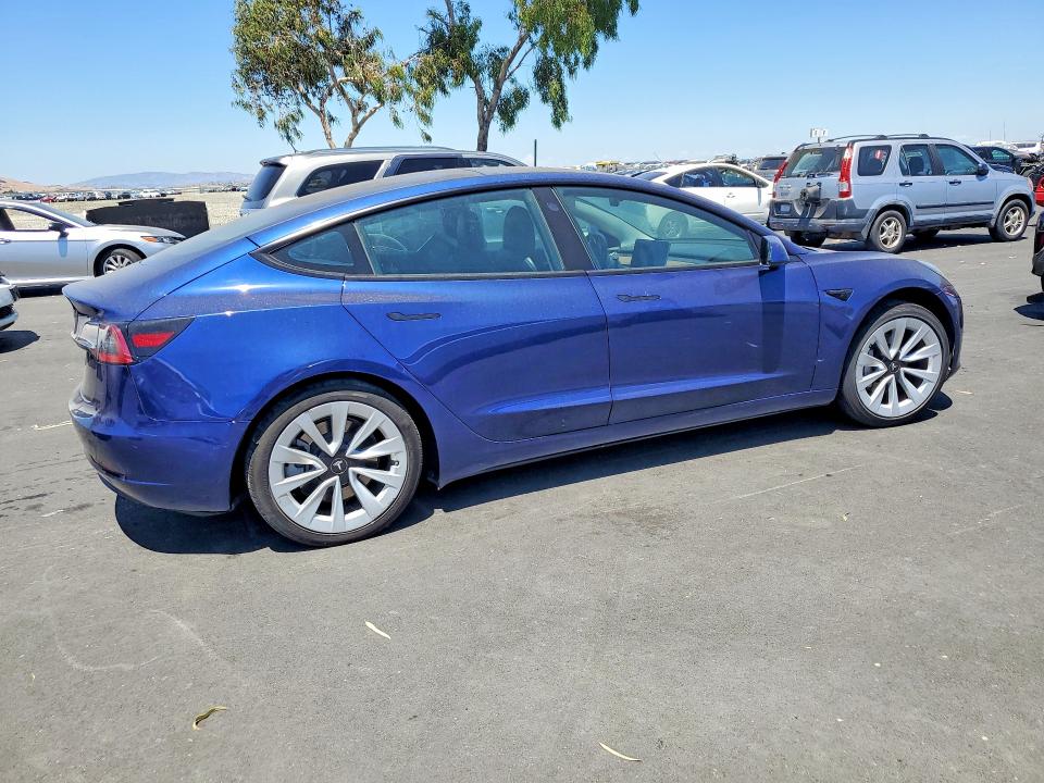 Photo 3 from auction – 2022 TESLA MODEL 3 with VIN 5YJ3E1EA3NF129929