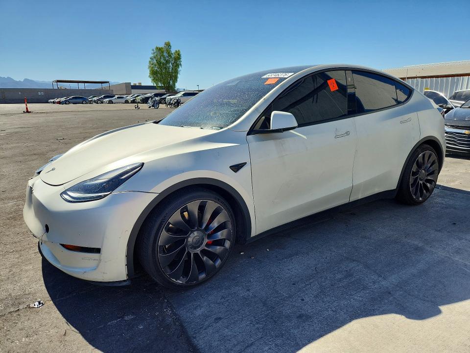 TESLA MODEL Y 2022 with VIN 7SAYGDEF6NF337545 - Photo from auction