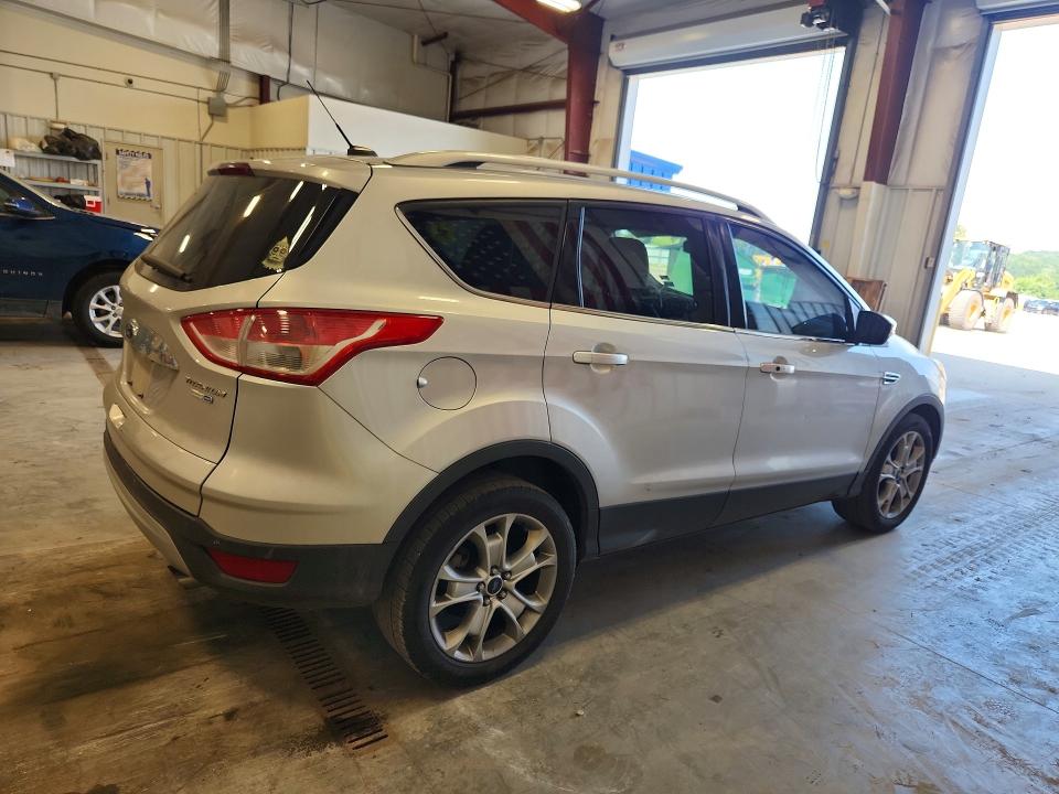 Photo 3 from auction – 2014 FORD ESCAPE with VIN 1FMCU9JX4EUD58358