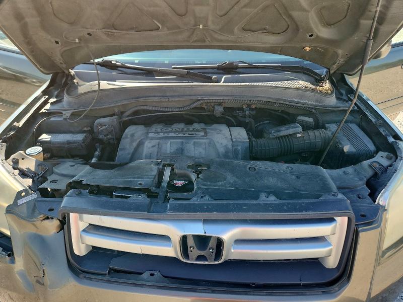Photo 12 from auction – 2006 HONDA PILOT with VIN 5FNYF18656B024451