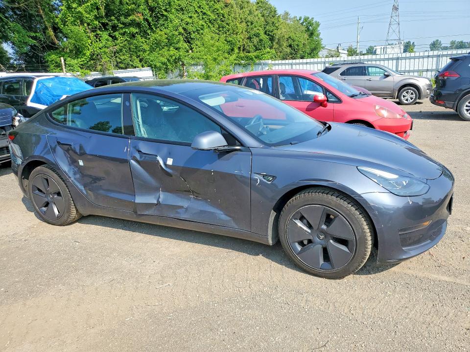 Photo 4 from auction – 2023 TESLA MODEL 3 with VIN LRW3E1FA2PC876174
