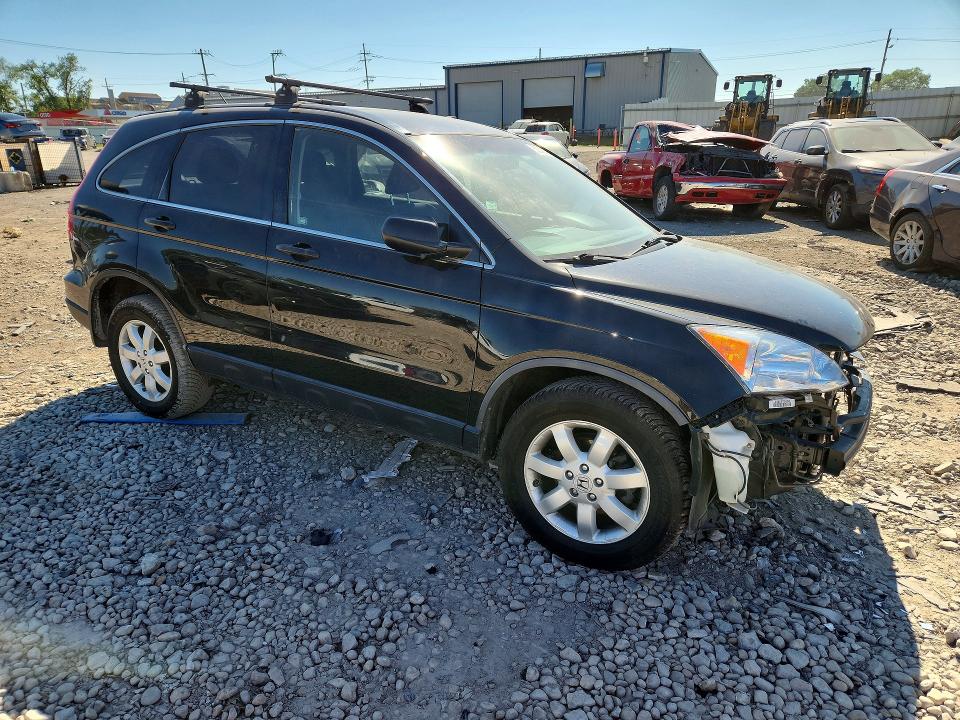 Photo 4 from auction – 2011 HONDA CR-V with VIN JHLRE4H40BC017201