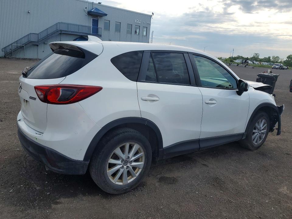 Photo 3 from auction – 2014 MAZDA CX-5 with VIN JM3KE2CYXE0333733