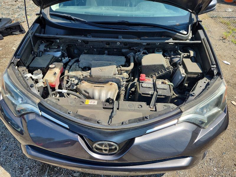 Photo 12 from auction – 2018 TOYOTA RAV4 with VIN JTMRFREV4JJ720234