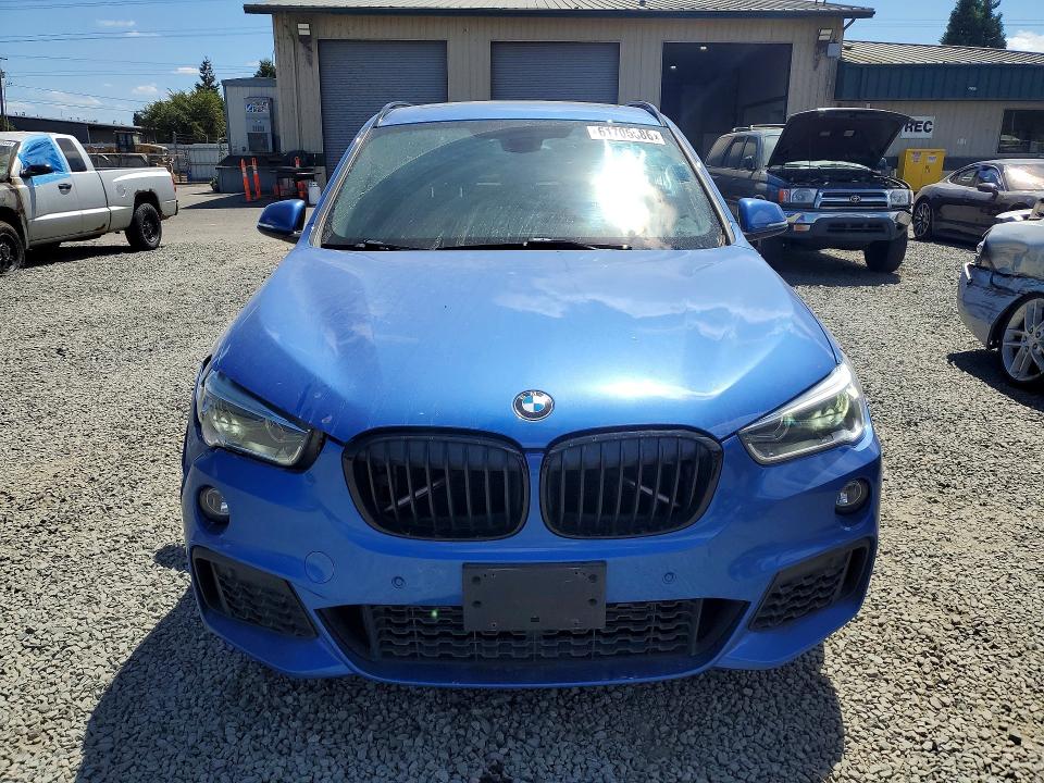 Photo 5 from auction – 2017 BMW X1 with VIN WBXHT3C39H5F86686