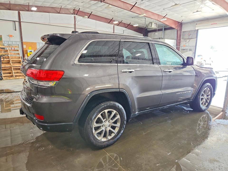 Photo 3 from auction – 2014 JEEP GRAND CHEROKEE with VIN 1C4RJFBG1EC447329