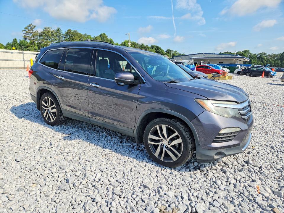 Photo 4 from auction – 2017 HONDA PILOT with VIN 5FNYF5H92HB011662