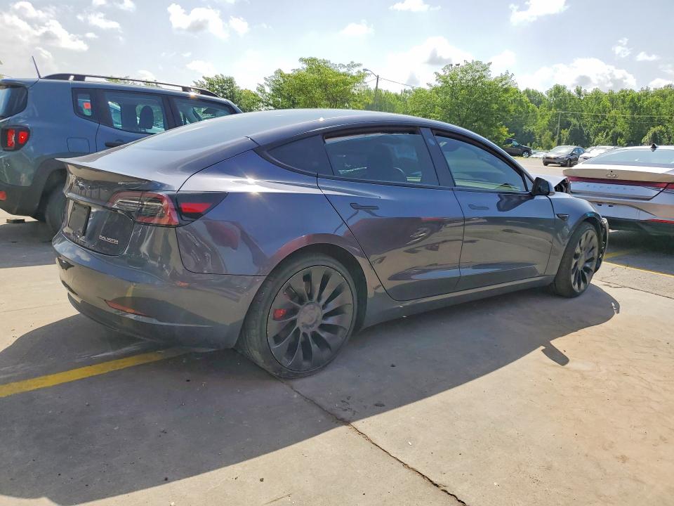 Photo 3 from auction – 2022 TESLA MODEL 3 with VIN 5YJ3E1EC9NF299214