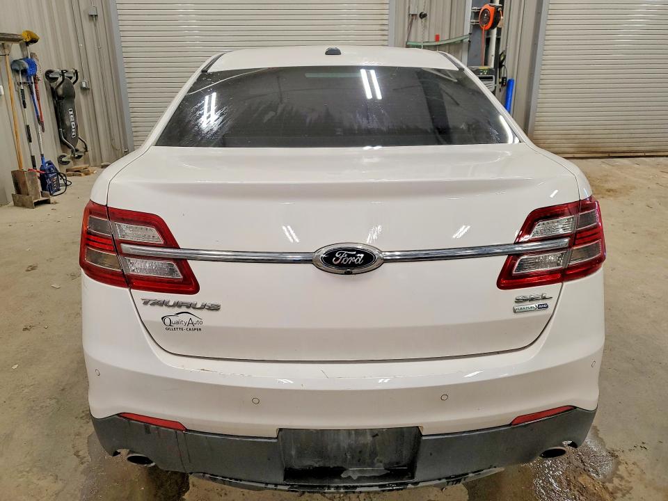 Photo 6 from auction – 2015 FORD TAURUS with VIN 1FAHP2H83FG179998