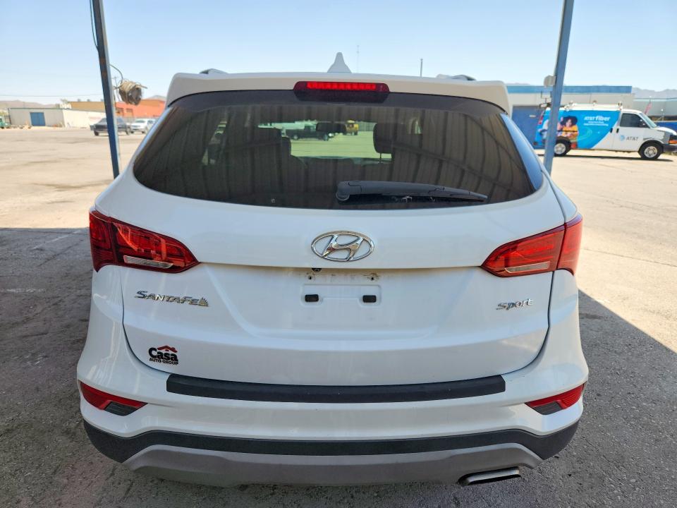 Снимка 6 от търг – 2018 HYUNDAI SANTA FE SPORT с VIN 5NMZU3LB7JH103203
