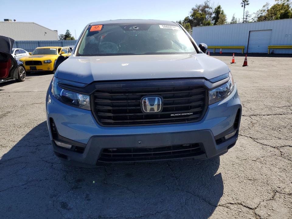 Photo 5 from auction – 2023 HONDA RIDGELINE with VIN 5FPYK3F85PB045093