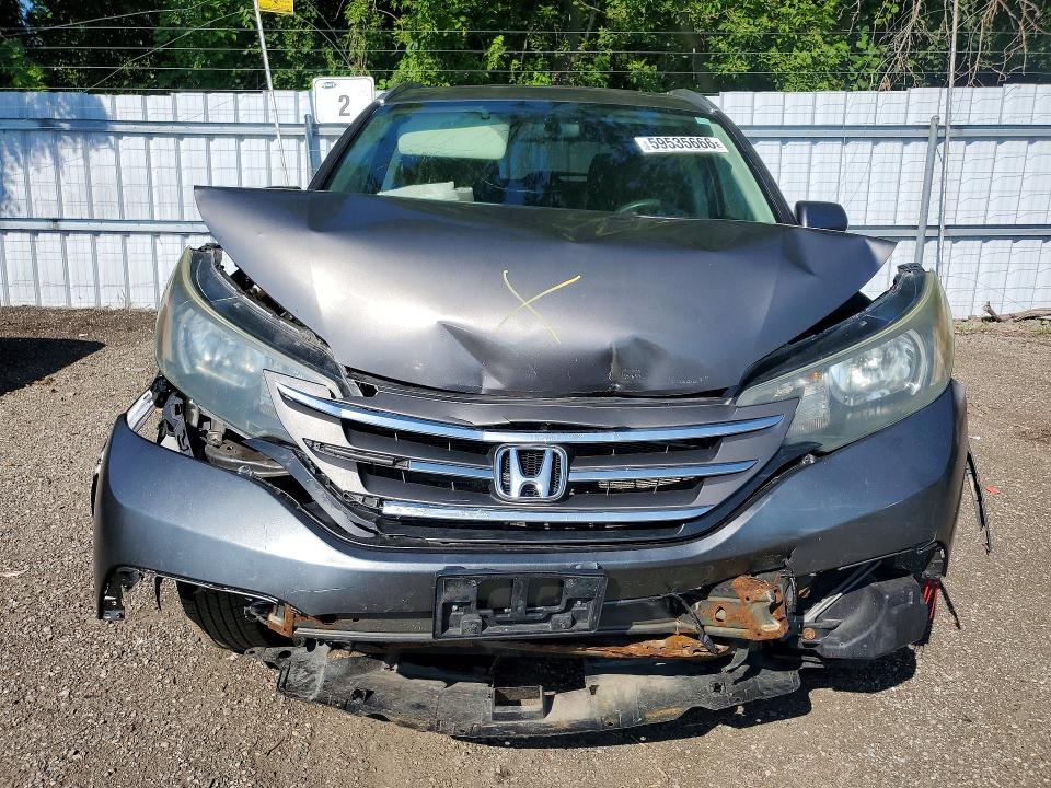 Photo 5 from auction – 2014 HONDA CR-V with VIN 2HKRM4H56EH111262