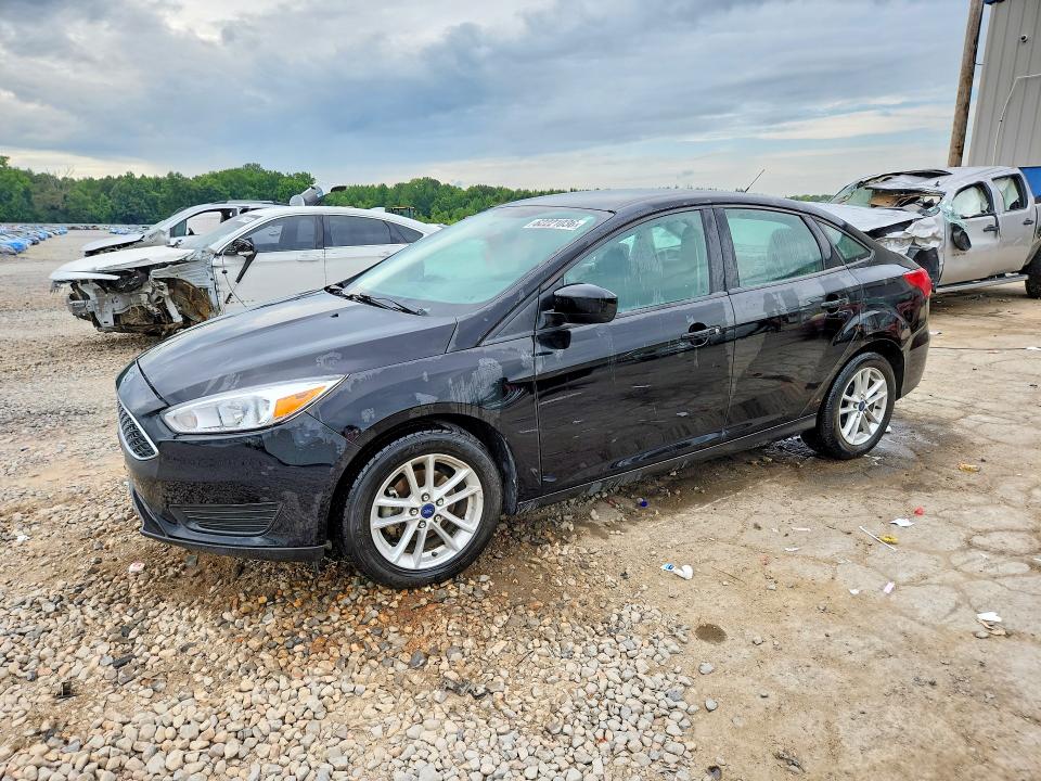 FORD FOCUS 2018 with VIN 1FADP3F21JL212340 - Photo from auction