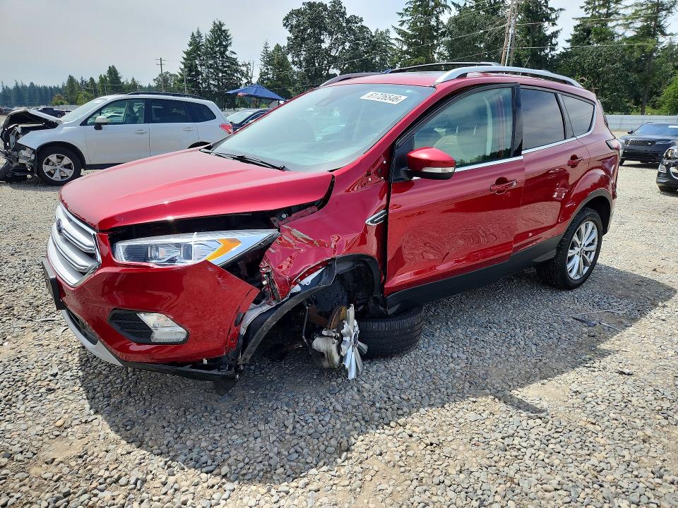 FORD ESCAPE 2018 with VIN 1FMCU9J94JUD05798 - Photo from auction