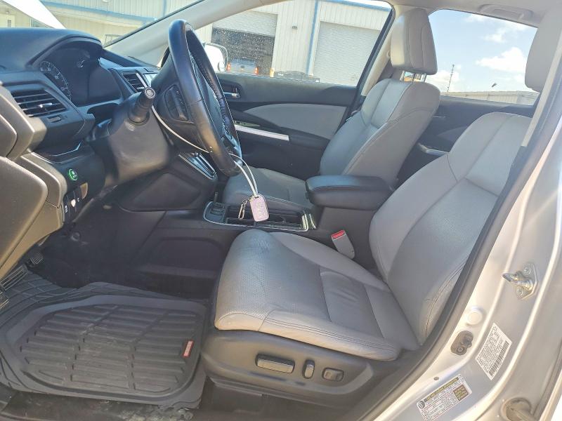 Photo 7 from auction – 2015 HONDA CR-V with VIN 2HKRM4H74FH615859