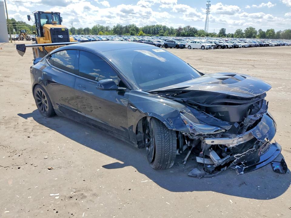 Photo 4 from auction – 2021 TESLA MODEL 3 with VIN 5YJ3E1EB9MF046352