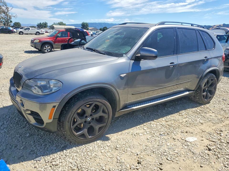 BMW X5 2012 with VIN 5UXZW0C58C0B90181 - Photo from auction