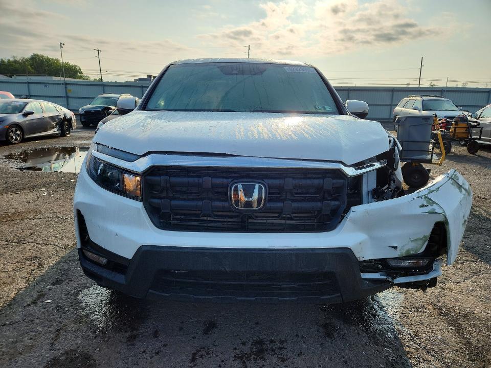 Photo 5 from auction – 2026 HONDA RIDGELINE with VIN 5FPYK3F58TB013352
