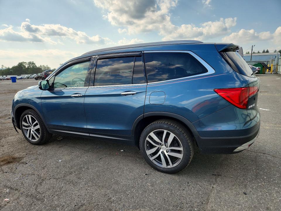 Photo 2 from auction – 2016 HONDA PILOT with VIN 5FNYF6H02GB127157