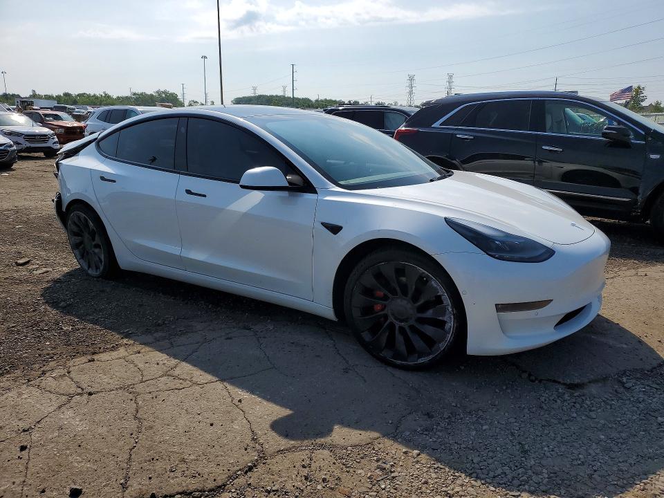 Photo 4 from auction – 2022 TESLA MODEL 3 with VIN 5YJ3E1EC4NF297693