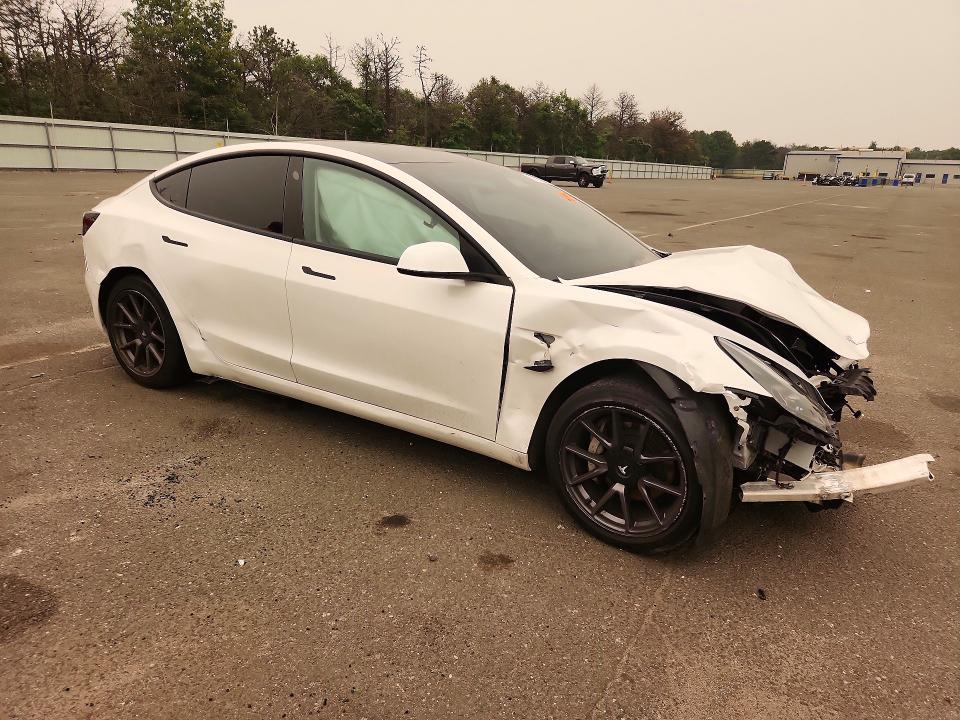Photo 4 from auction – 2021 TESLA MODEL 3 with VIN 5YJ3E1EA4MF915950