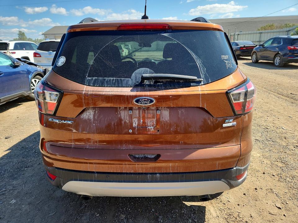 Photo 6 from auction – 2017 FORD ESCAPE with VIN 1FMCU9GD9HUB68251