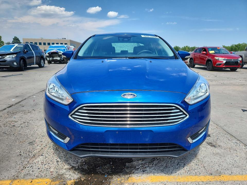 Photo 5 from auction – 2018 FORD FOCUS with VIN 1FADP3J22JL260095