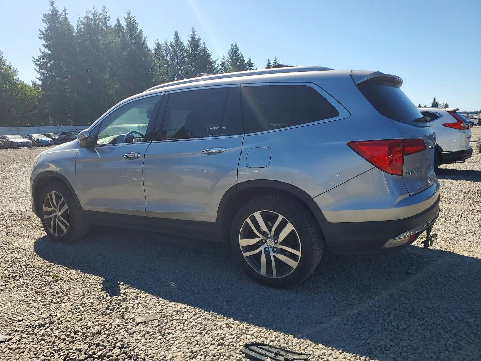 Photo 2 from auction – 2016 HONDA PILOT with VIN 5FNYF6H09GB123817