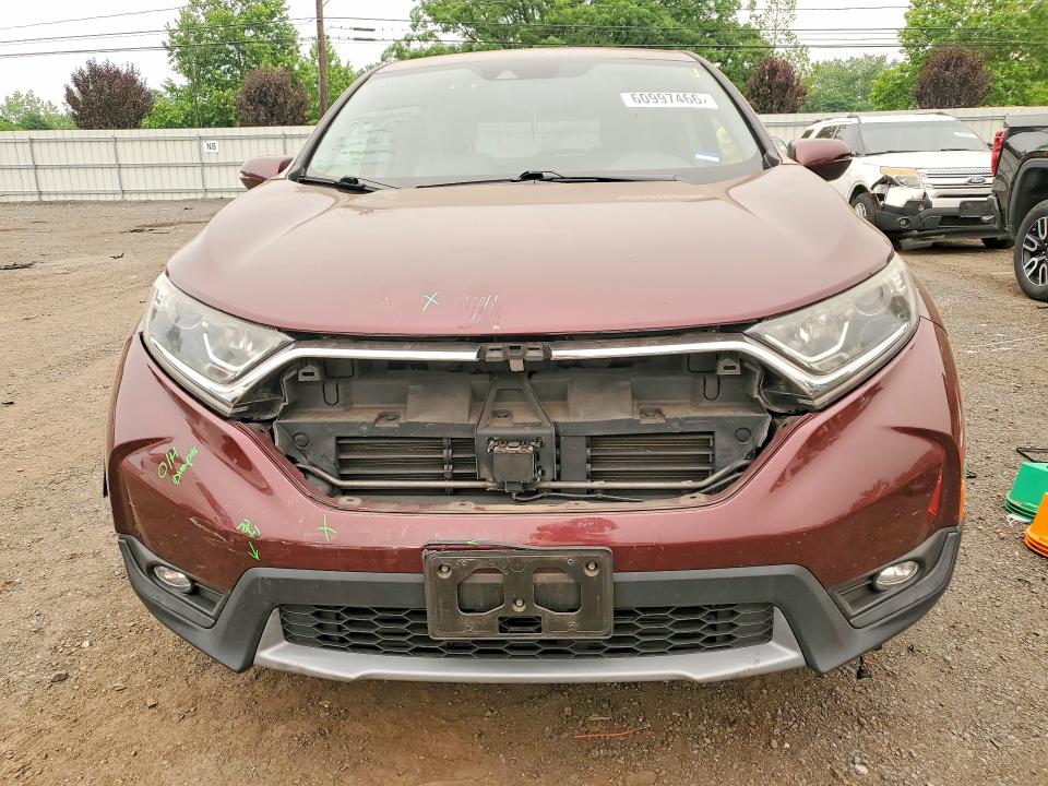 Photo 5 from auction – 2018 HONDA CR-V with VIN 2HKRW2H52JH699752