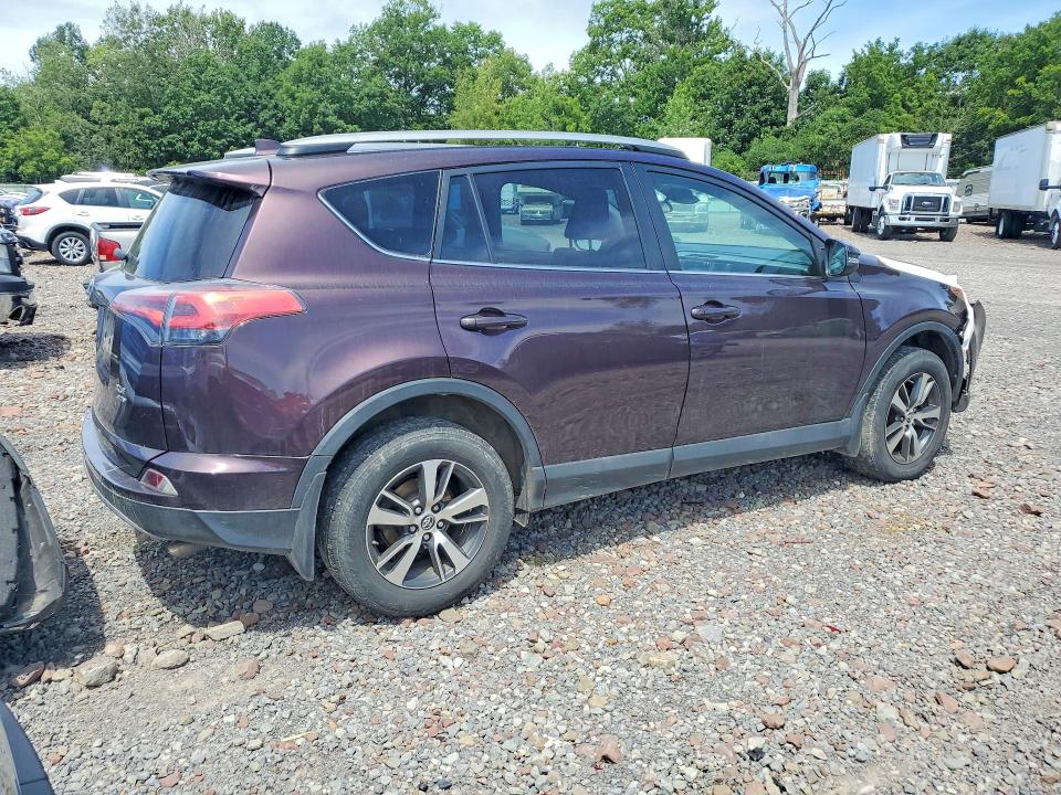 Photo 3 from auction – 2018 TOYOTA RAV4 with VIN 2T3RFREV0JW819473