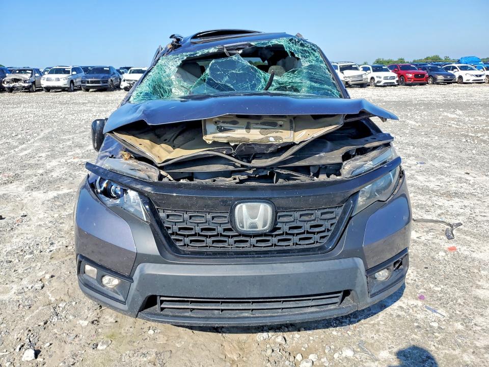 Photo 5 from auction – 2020 HONDA PASSPORT with VIN 5FNYF7H52LB003546