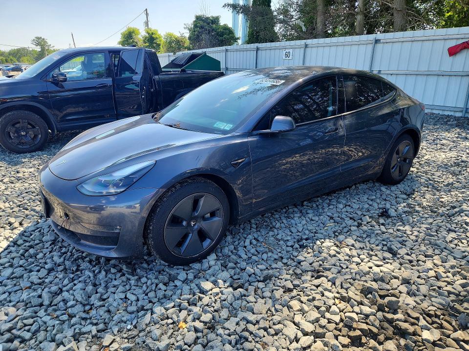 TESLA MODEL 3 2021 with VIN 5YJ3E1EB9MF032547 - Photo from auction