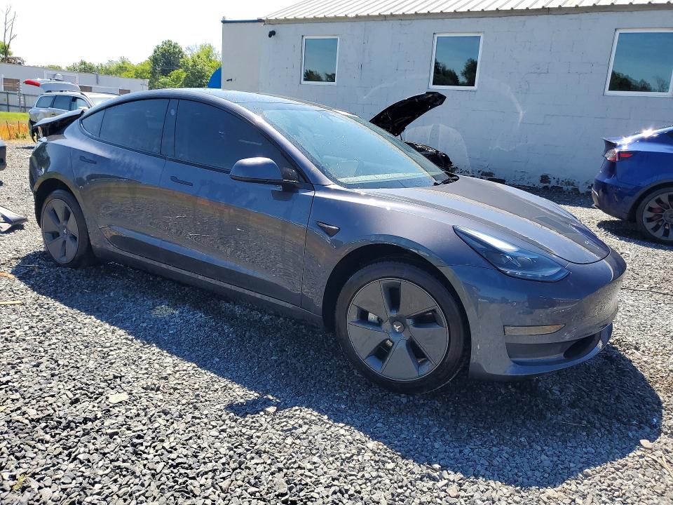 Photo 4 from auction – 2023 TESLA MODEL 3 with VIN 5YJ3E1EA1PF699950
