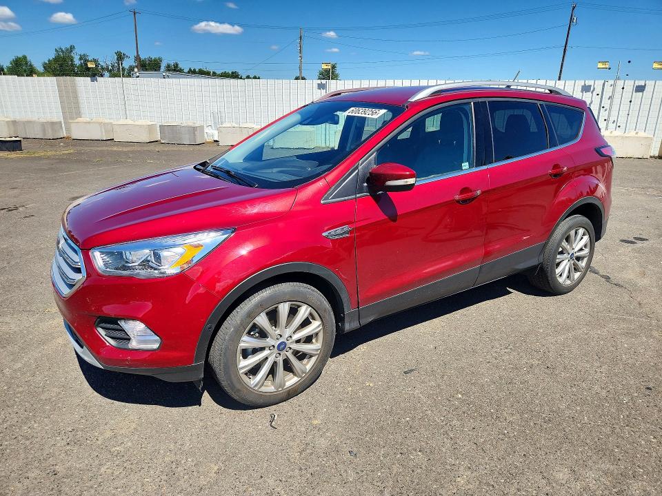 FORD ESCAPE 2018 with VIN 1FMCU0J95JUA04792 - Photo from auction