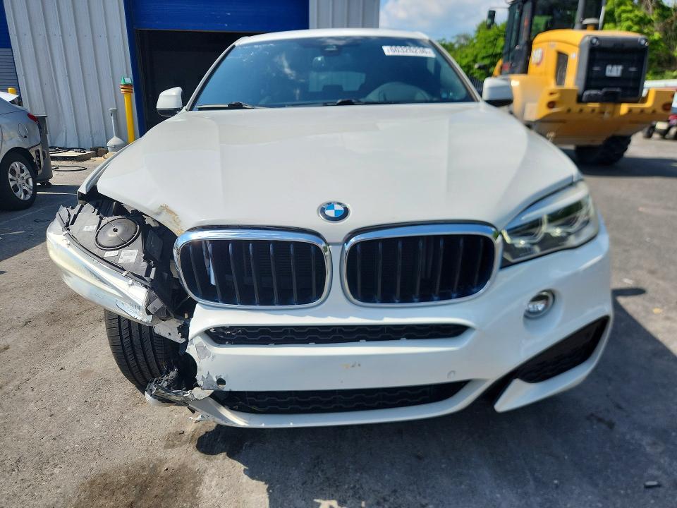 Photo 5 from auction – 2018 BMW X6 with VIN 5UXKU2C58J0X48916