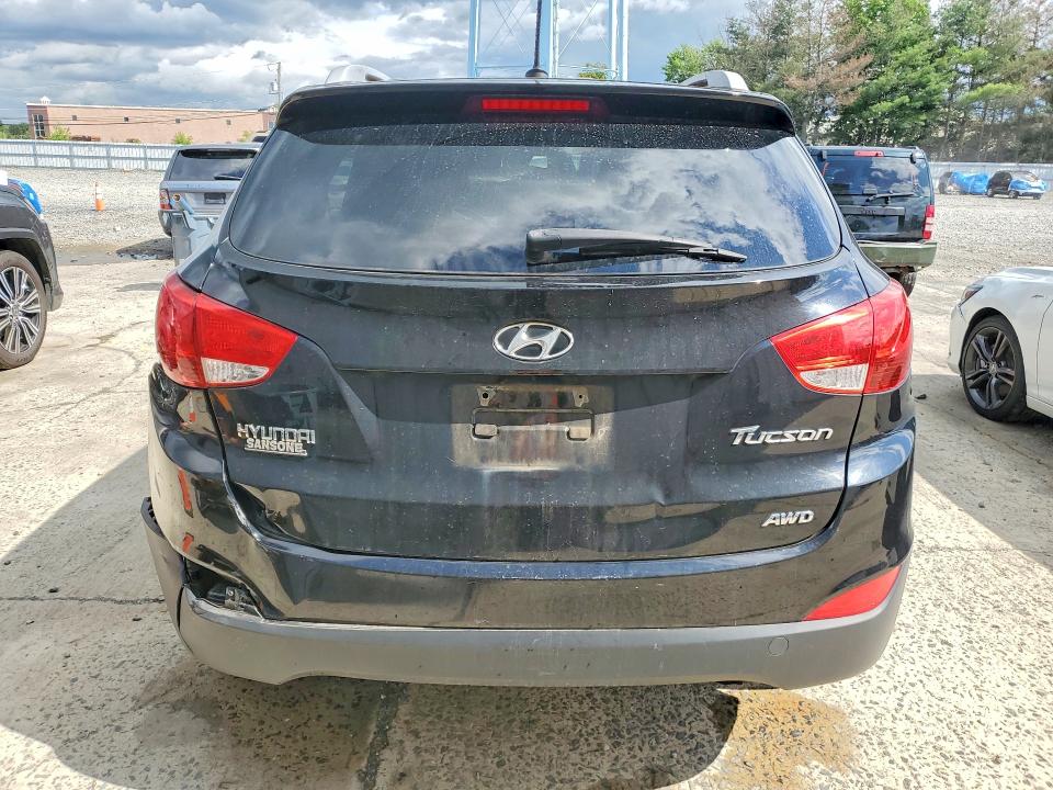 Photo 6 from auction – 2013 HYUNDAI TUCSON with VIN KM8JUCAC8DU709367