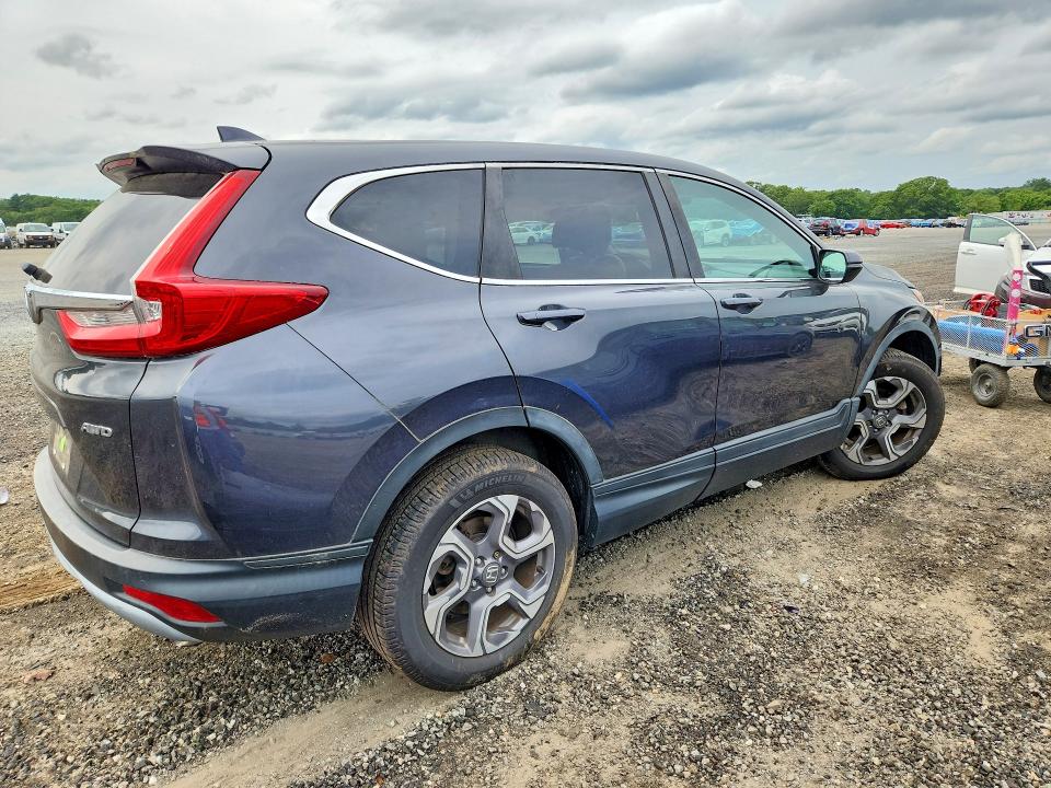 Photo 3 from auction – 2018 HONDA CR-V with VIN 7FARW2H8XJE048446