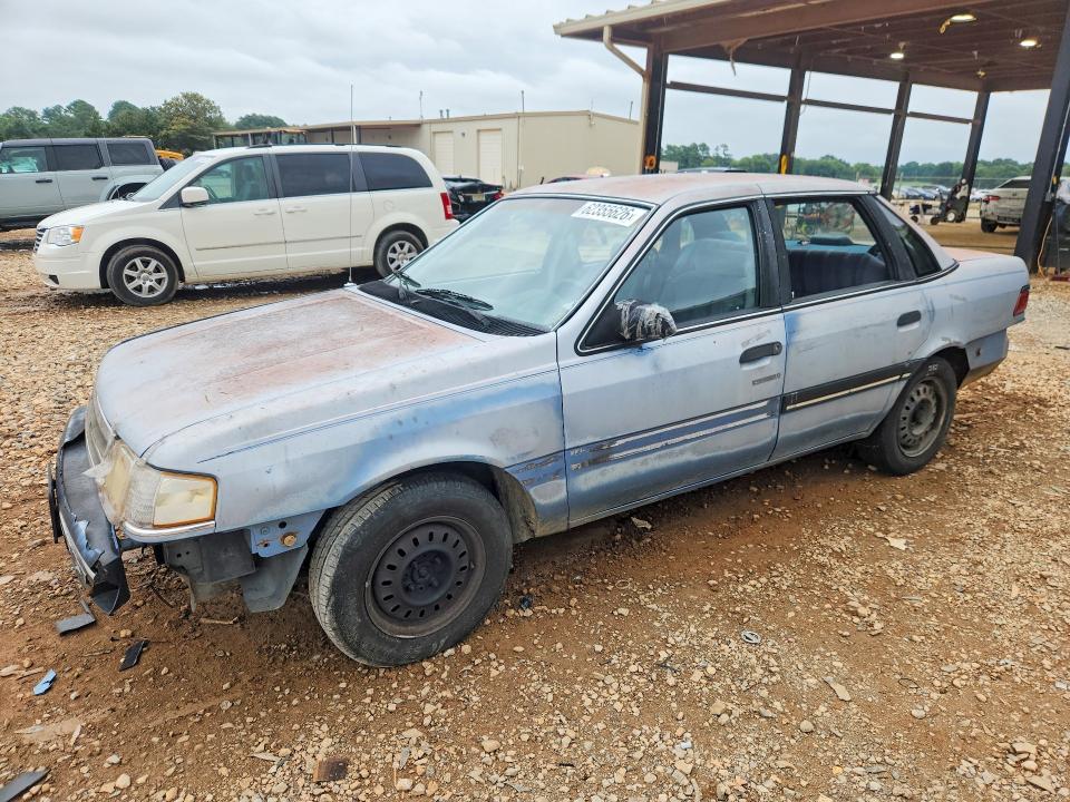 FORD TEMPO 1990 z numerem VIN 1FAPP36X4LK144276 - Zdjęcie z aukcji