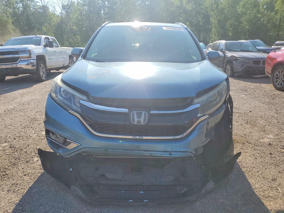Photo 5 from auction – 2016 HONDA CR-V with VIN 5J6RM4H99GL802443