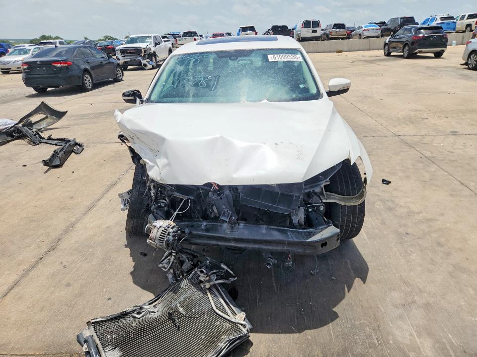 Photo 5 from auction – 2013 VOLKSWAGEN PASSAT with VIN 1VWCM7A36DC044508