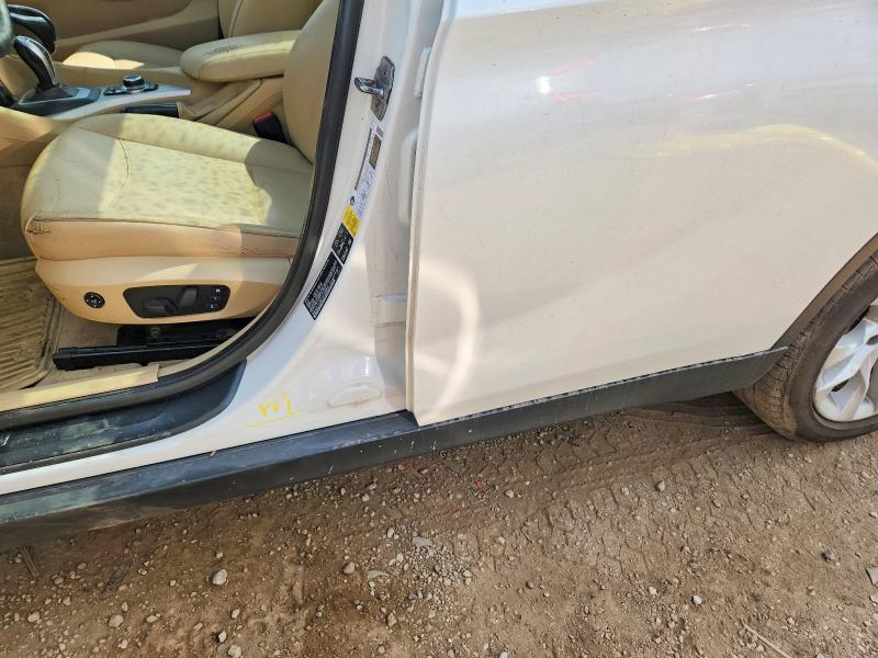 Foto 13 de la subasta – 2015 BMW X1 con VIN WBAVL1C50FVY39889