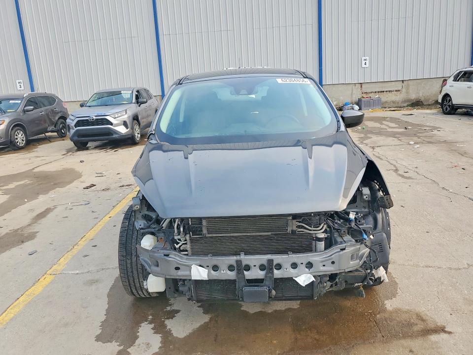 Photo 5 from auction – 2019 FORD ESCAPE with VIN 1FMCU9GD6KUB23680