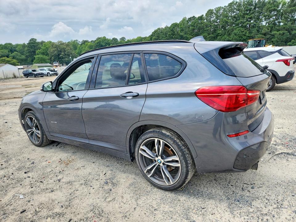 Photo 2 from auction – 2016 BMW X1 with VIN WBXHT3C32G5E49233