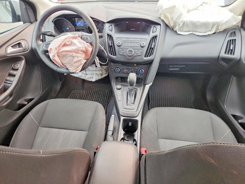 Photo 8 from auction – 2018 FORD FOCUS with VIN 1FADP3F24JL264612