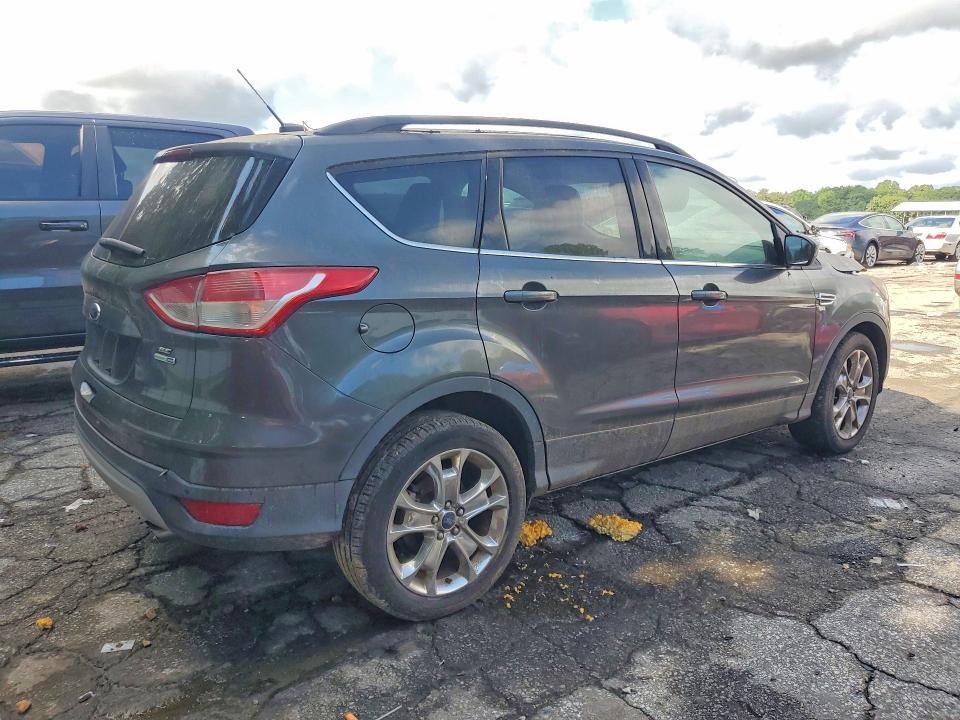 Photo 3 from auction – 2016 FORD ESCAPE with VIN 1FMCU9GX0GUB79924