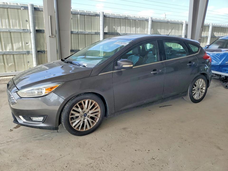 FORD FOCUS 2017 with VIN 1FADP3N24HL230276 - Photo from auction
