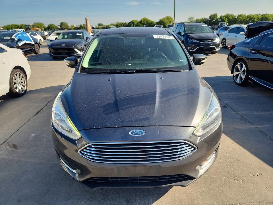 Photo 5 from auction – 2017 FORD FOCUS with VIN 1FADP3N22HL320588