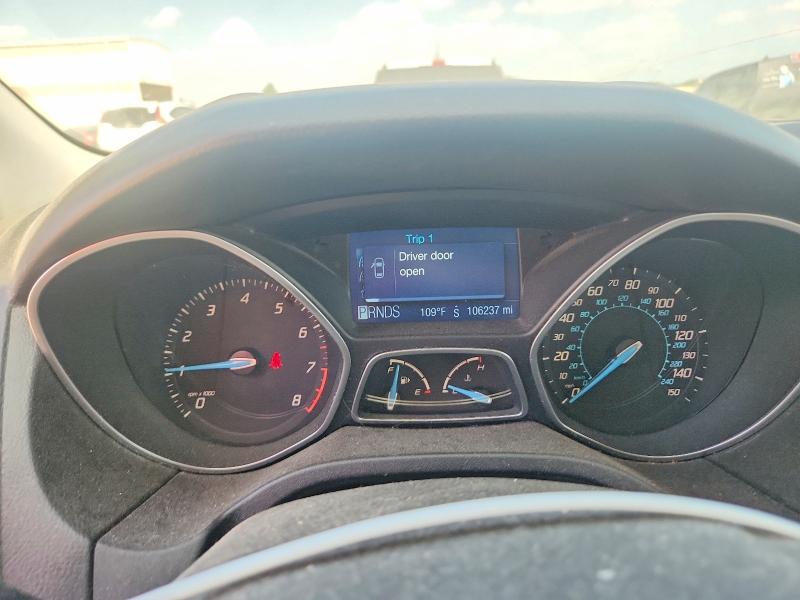 Photo 9 from auction – 2012 FORD FOCUS with VIN 1FAHP3M2XCL114317